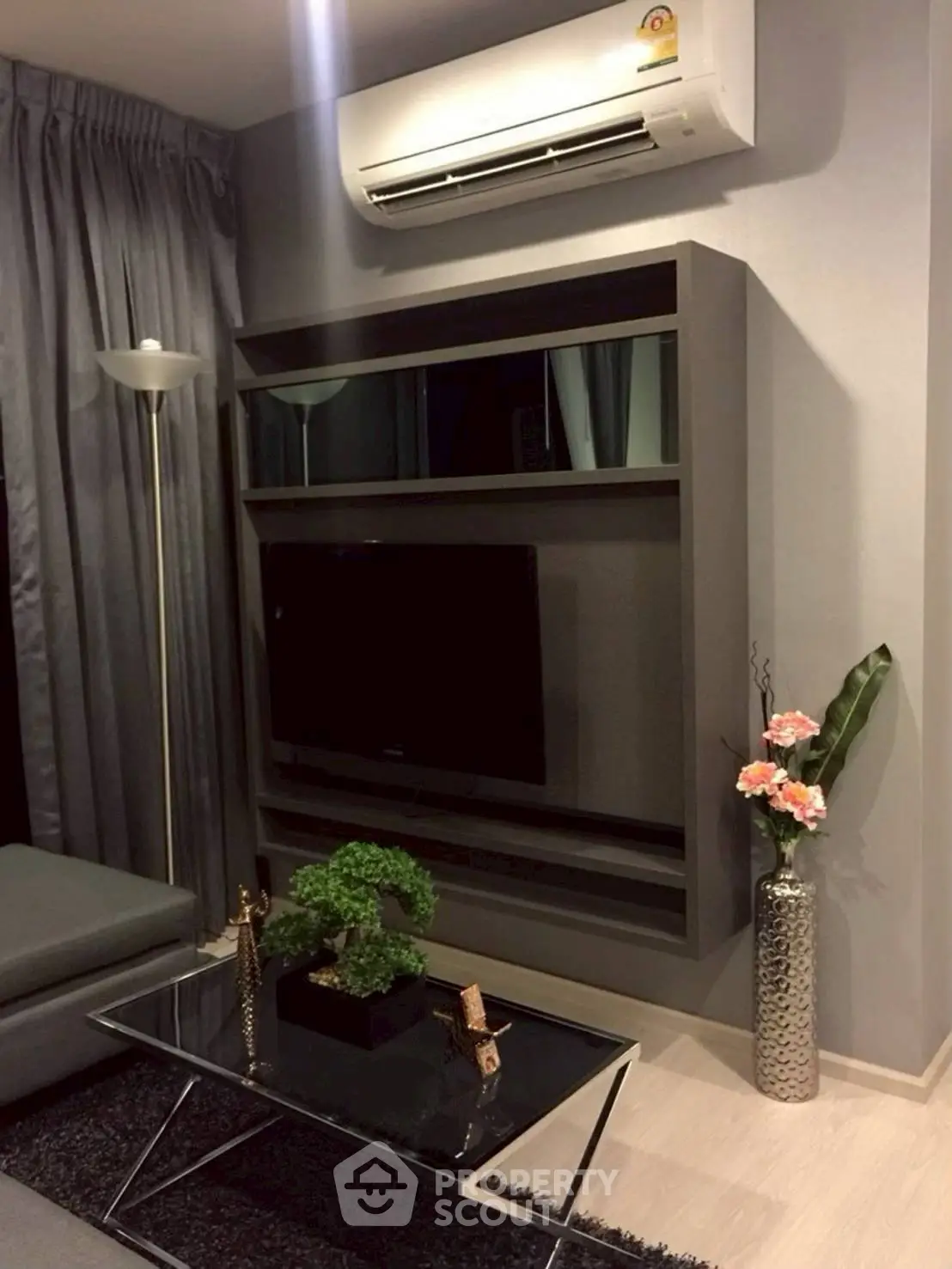 Modern living room with sleek TV setup and stylish decor