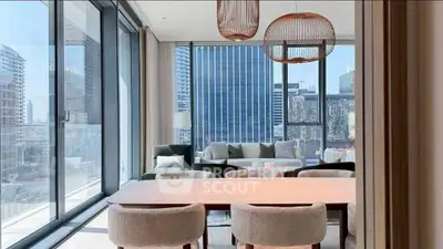 Luxurious modern living room with floor-to-ceiling windows and city view