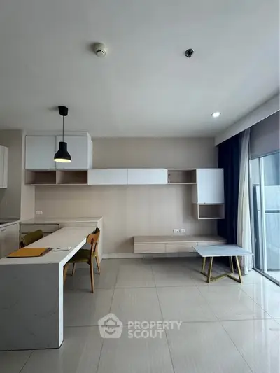 Modern minimalist kitchen with open layout and stylish furniture