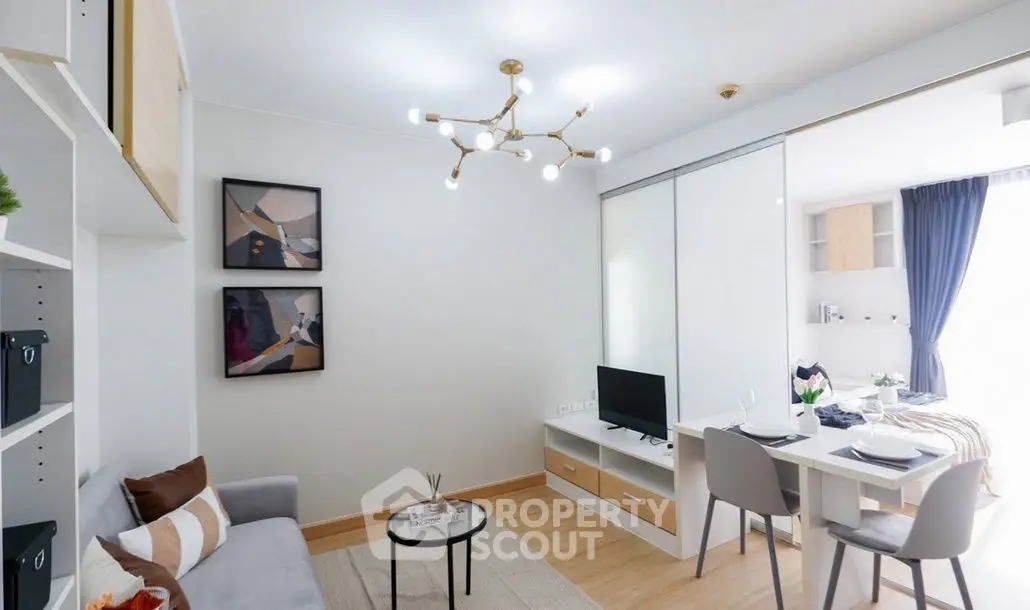 Modern living room with stylish decor and open layout dining area