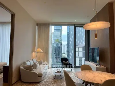 Luxurious modern living room with city view, elegant furniture, and stylish decor in high-rise apartment.