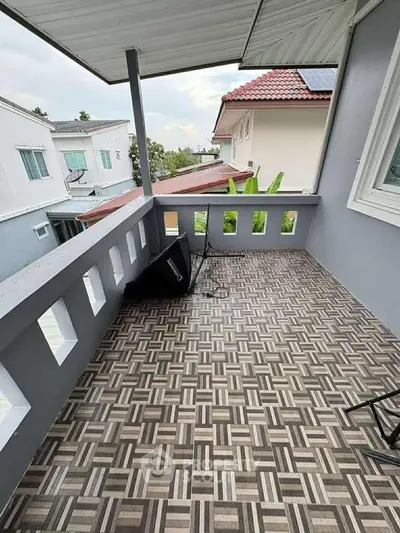 Spacious balcony with patterned flooring and scenic neighborhood view, perfect for relaxation and outdoor enjoyment.