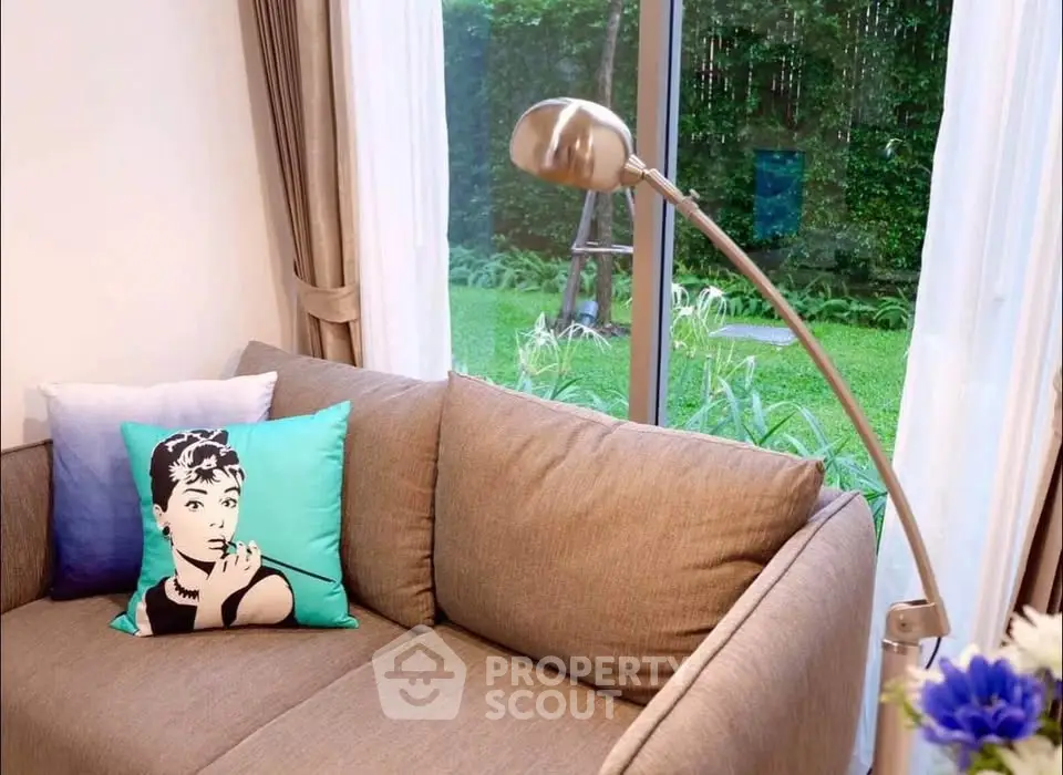 Cozy living room with garden view and stylish decor
