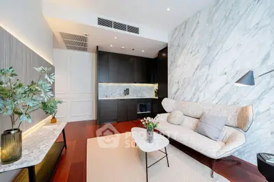Luxurious modern living room with elegant marble accents and stylish furniture