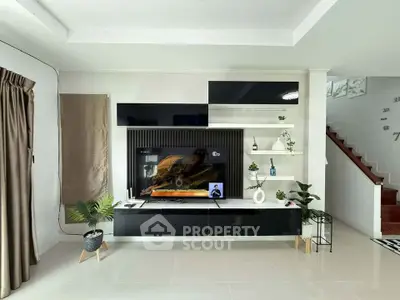 Modern living room with sleek entertainment center and stylish decor
