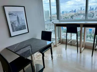Modern apartment dining area with city view and stylish furniture
