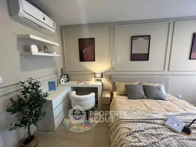Stylish bedroom with modern decor and cozy workspace