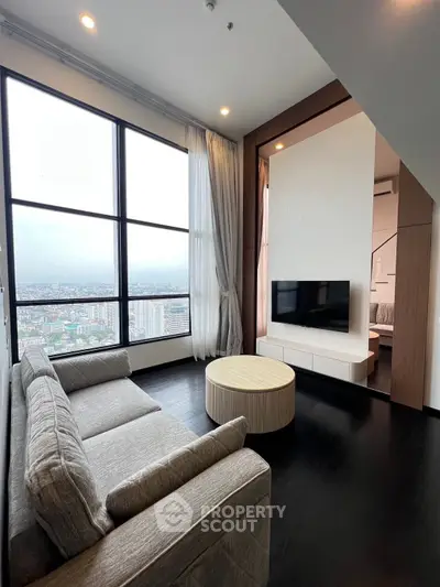 Modern living room with panoramic city view and stylish furniture