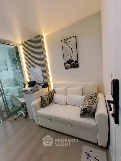 Modern living room with stylish decor and cozy seating area in a contemporary apartment.