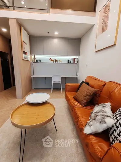 Stylish modern living room with leather sofa and chic decor