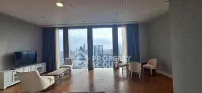 Luxurious living room with stunning city view and elegant furnishings