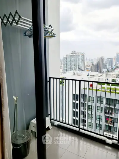 Modern balcony with city view, perfect for urban living and relaxation.
