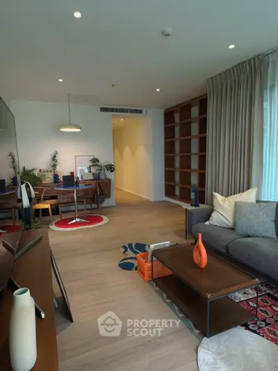 Spacious modern living room with elegant decor and natural light
