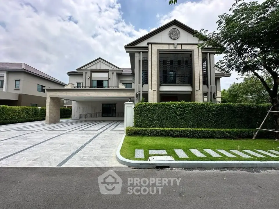 Luxurious modern mansion with grand entrance and spacious driveway in a serene neighborhood.
