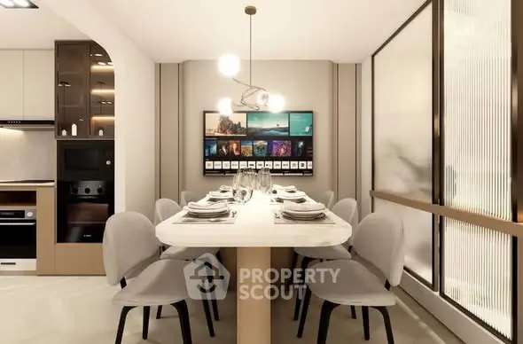 Modern dining area with elegant lighting and sleek kitchen design