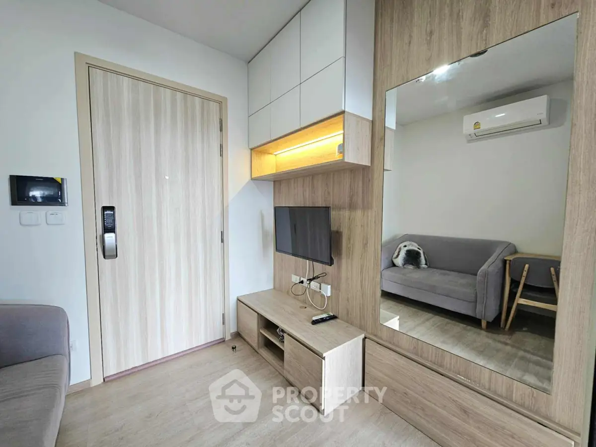 Modern living room with sleek wooden accents and cozy seating area