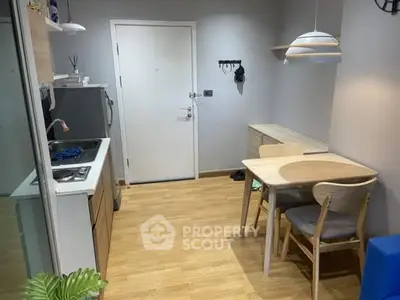 Cozy kitchen with dining area in modern apartment