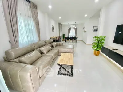 Spacious modern living room with elegant decor and large sofa