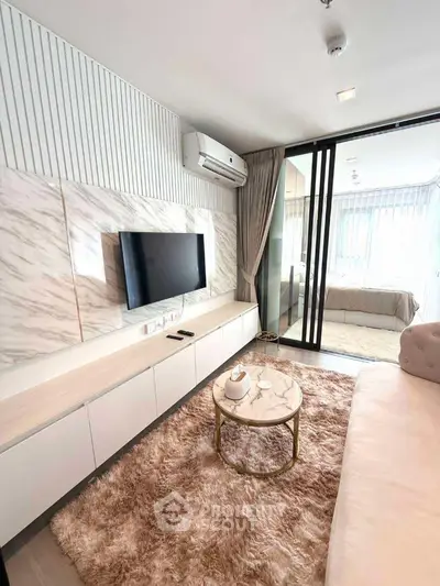 Modern living room with marble accents and cozy decor in stylish apartment