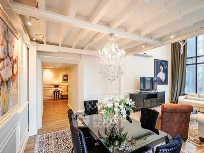 Luxurious living room with elegant chandelier and stylish decor