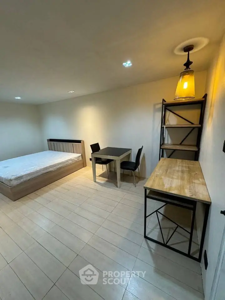 Modern minimalist bedroom with stylish furniture and ambient lighting