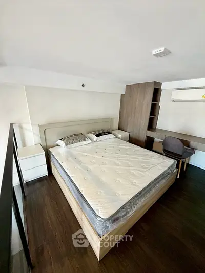 Modern bedroom with stylish furniture and cozy ambiance