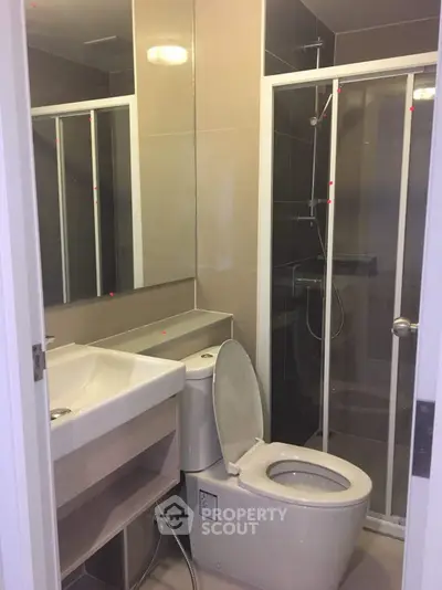 Modern bathroom with sleek design and glass shower enclosure
