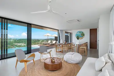 Luxurious open-plan living room with stunning panoramic views and modern decor