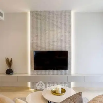 Modern living room with sleek TV wall and elegant decor