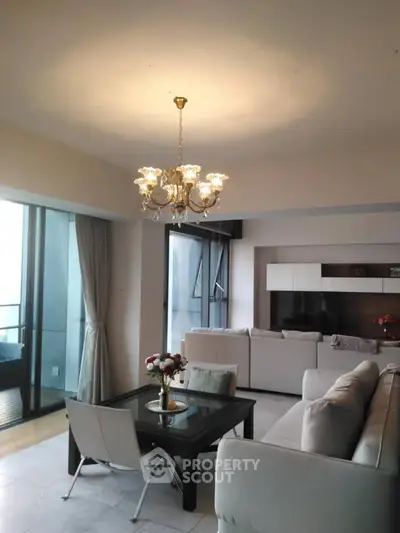 Luxurious living room with elegant chandelier and modern decor