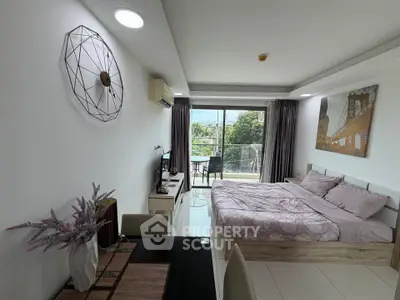Modern studio apartment with balcony and stylish decor