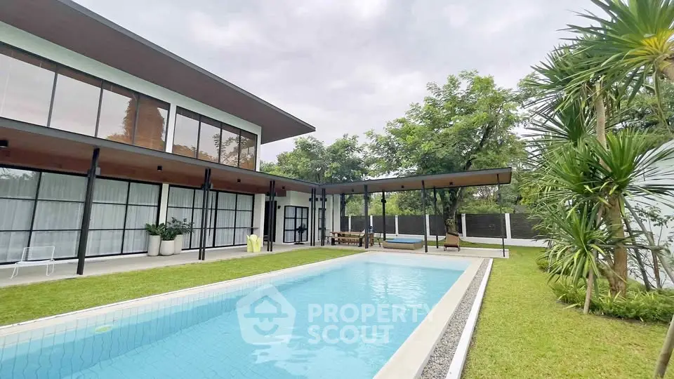 Luxurious modern home with private pool and lush garden