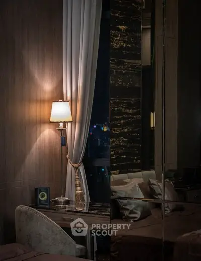 Luxurious bedroom with elegant decor and city view