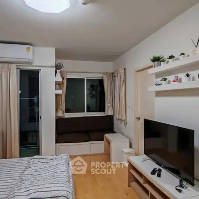 Cozy studio apartment with modern decor and natural light
