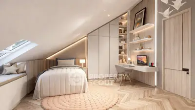 Charming attic bedroom with modern design and cozy workspace