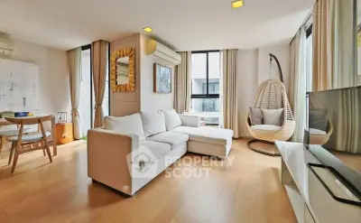 Spacious modern living room with elegant decor and natural light