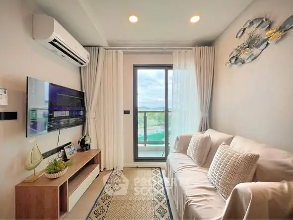 Cozy living room with modern decor and balcony view