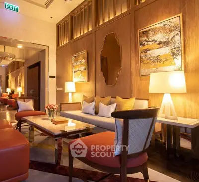 Luxurious living room with elegant decor and warm lighting, perfect for relaxation and entertaining guests.