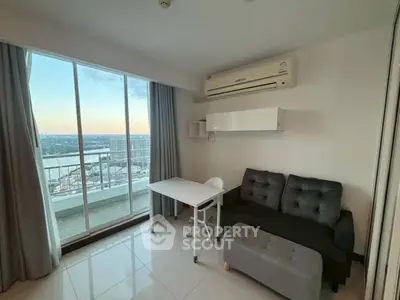 Modern living room with balcony and stunning city view