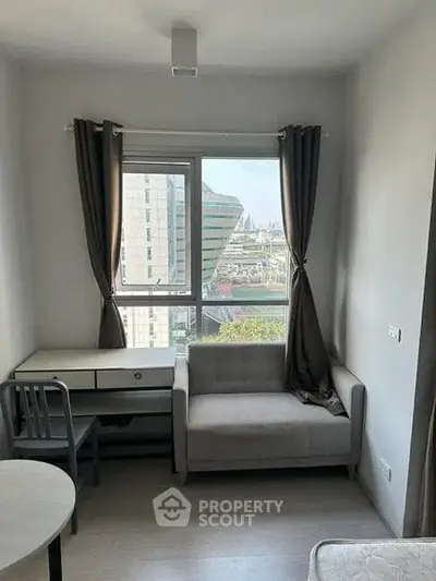 Cozy study nook with city view in modern apartment