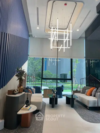 Luxurious modern living room with high ceilings and stylish lighting