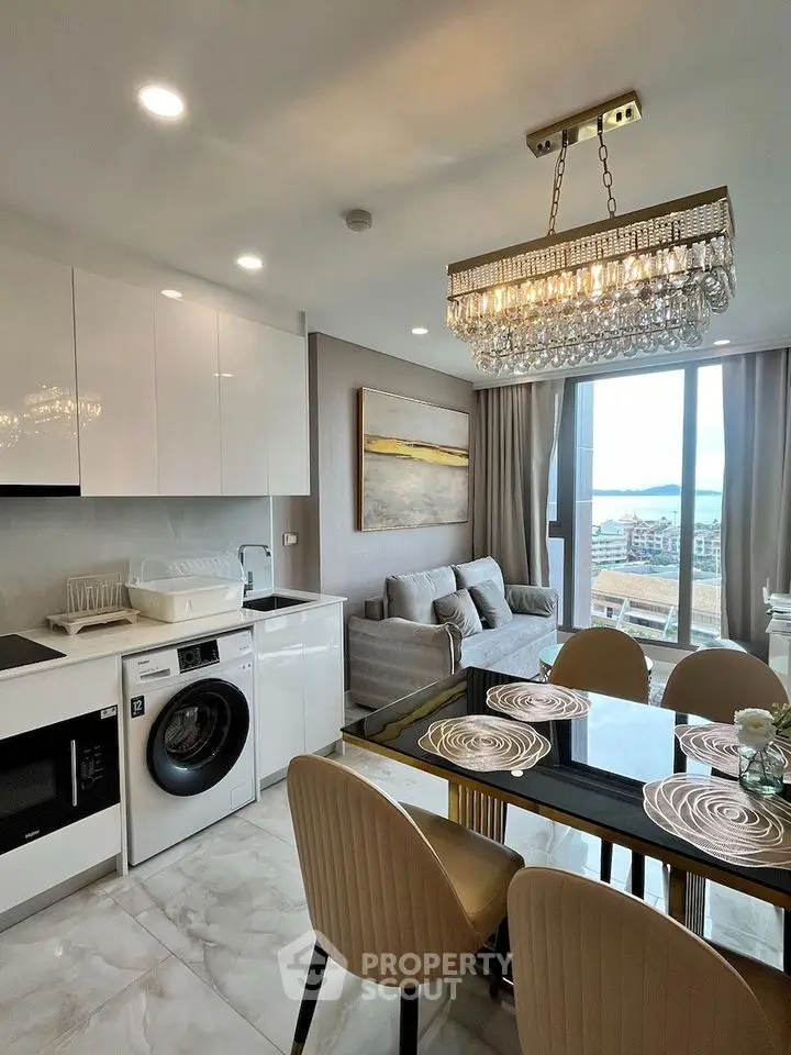 Luxurious open-plan living room with modern kitchen and stunning view