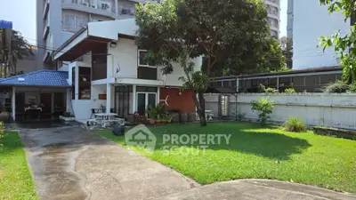 Charming suburban home with lush garden and spacious driveway, perfect for family living.