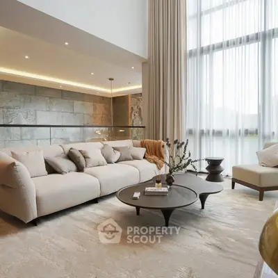 Luxurious living room with high ceilings and elegant decor