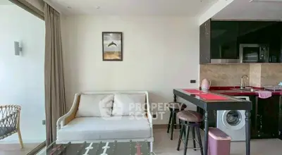 Modern living room with open kitchen and stylish decor