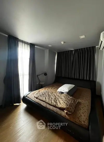 Modern bedroom with sleek design and natural light
