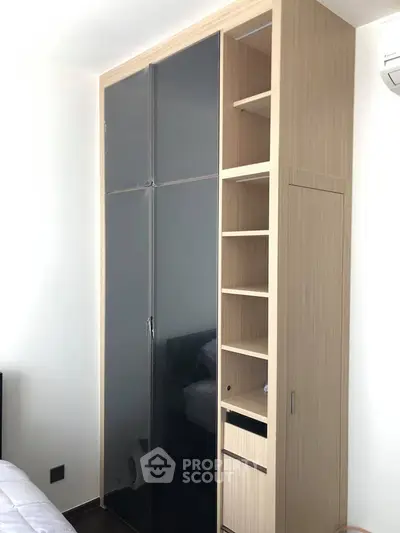 Modern bedroom with sleek built-in wardrobe and minimalist design