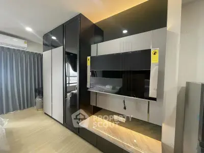 Modern living room with sleek built-in storage and entertainment unit