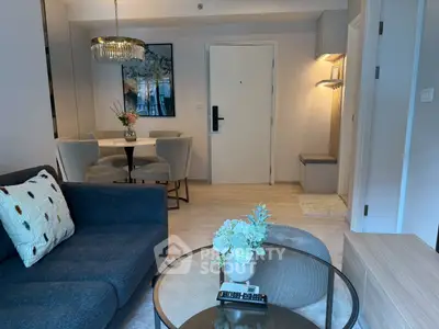 Stylish living room with modern decor and elegant dining area