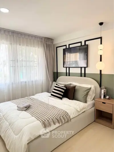 Cozy and stylish bedroom with modern decor and natural light